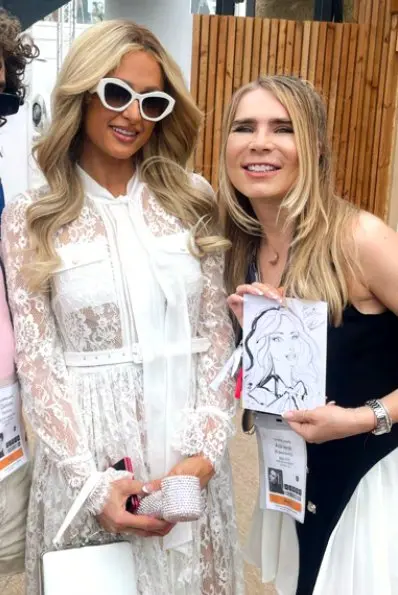 Adriana Vita with Paris Hilton and her portrait