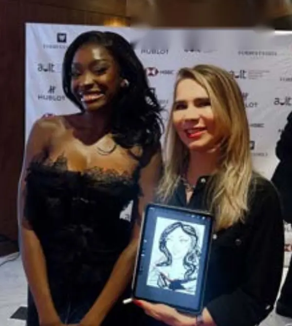 Chelsea Lazkani of Selling Sunset with Adriana and her iPad portrait