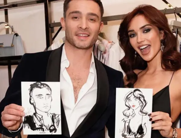 Ed Westwick and Amy Jackson holding their live portraits